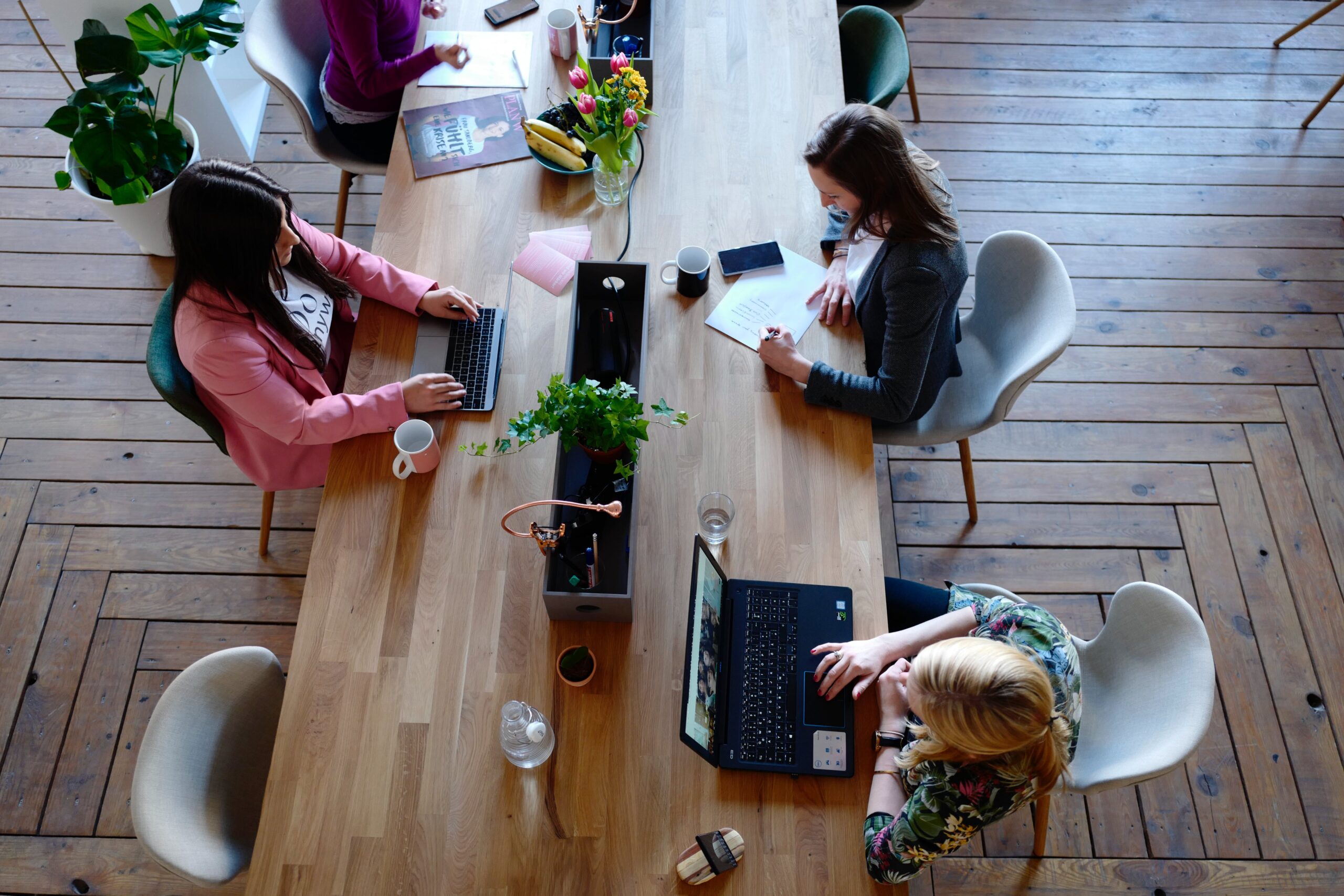 long-table-four-women-working